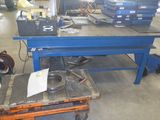 an image of a workbench in a factory with a lot of tools