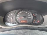 a close up of a car dashboard with a speedometer