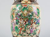 an image of a vase with a painting on it sitting on a table