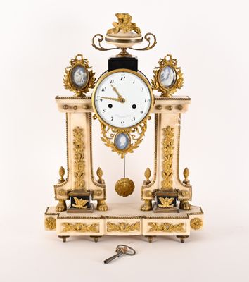 a clock that is sitting on top of a table