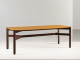 a coffee table with a wooden top on a white surface