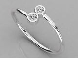 une bague en or blanc sertie de deux diamants