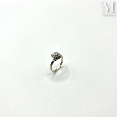 an image of a diamond ring on a white surface