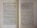 an open book that has a picture of a cat on it