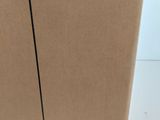 a cardboard box with a drawing of a trash can inside of it