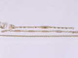 a gold chain bracelet and a gold chain bracelet