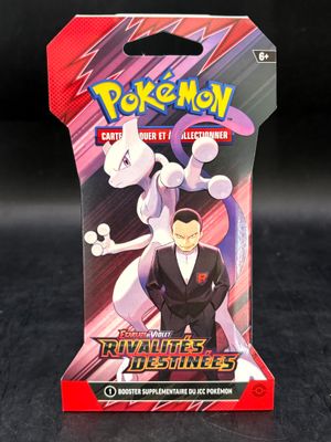 boîte de cartes à collectionner Pokémon avec l'image d'un homme en smoking