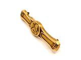 an image of a gold tie bar on a white background