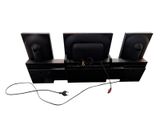 three televisions sitting on top of a shelf with wires