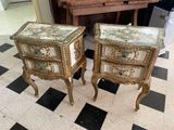 two tables that are sitting on a checkered floor