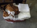 a suitcase full of clothes sitting on the floor