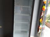 an image of a schweppes refrigerator in a store