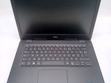 the dell laptop is open and ready to be used