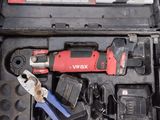 a tool box with tools in it sitting on the floor