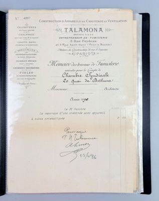 an old document with writing on it sitting on top of a table