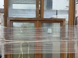 a large window that has been wrapped up on a pallet