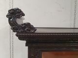 a picture of a mirror hanging on the wall