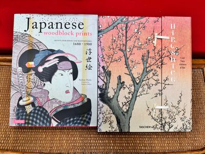 two books that are sitting on a chair