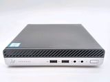 a close up of a laptop on a white surface