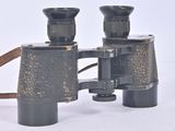 a pair of binoculars that are sitting on a table
