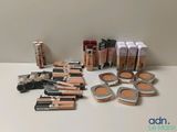 a close up of a table with a lot of makeup on it