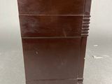a brown book that is sitting on a table