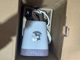 a box with a blender inside of it on the floor