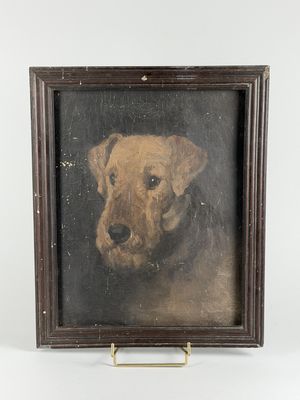 une peinture à l'huile représentant un chien, dans un cadre en bois, sur fond blanc