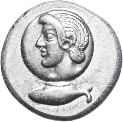 a close up of a coin with a man ' s face on it