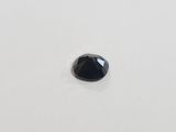 a black diamond on a white surface