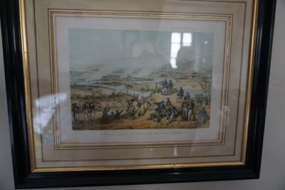 tableau encadré représentant un groupe d'hommes à cheval