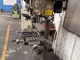 a machine that is sitting on the side of a building