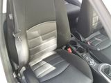 a car that has two seats in the back of it