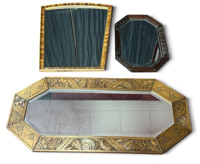 a mirror, a mirror and a mirror on a white surface