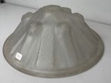 a glass cake pan sitting on a counter top
