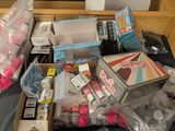 a pile of assorted items sitting on a desk
