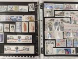 a black binder with stamps and stamps on it