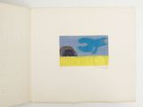 a picture of a book with a picture of a blue bird on it