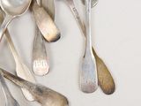 a lot of spoons and spoon spoons on the table