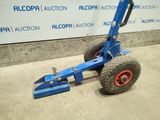 an image of a blue hand truck with red wheels