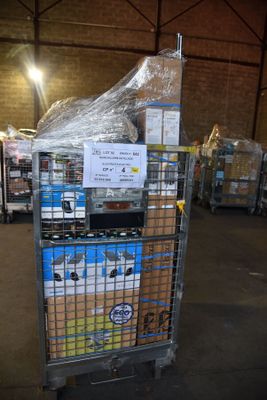 a cart that has some food on it in a warehouse
