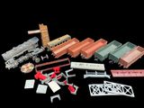 many different types of toy trains on a black background