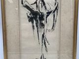 a black and white drawing of a woman in a dress in a gold frame
