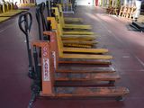 many pallets that are lined up in a warehouse