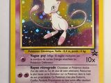 the pokemon card has a picture of a white cat on it ' s back
