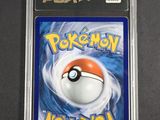 a close up of a pokemon card on a table