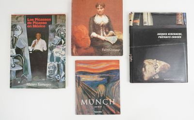 several books on a white table with a white background