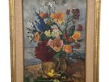 tableau représentant des fleurs dans un vase posé sur une table, sur fond blanc