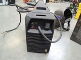 an image of a welding machine in a shop