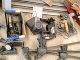 a lot of tools that are laying out on the floor